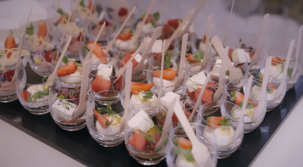 Fingerfood in small glasses for the guests of the grand opening of the Flagship salon